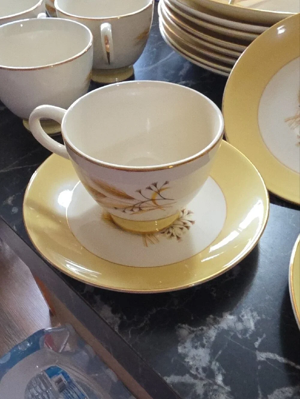 Yellow and White Floral Dinnerware with Gold Trim Accents